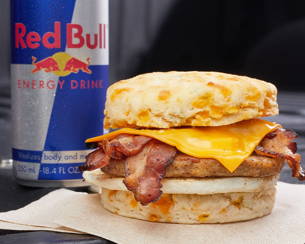 rewards breakfast biscuit sandwich and a redbull drink